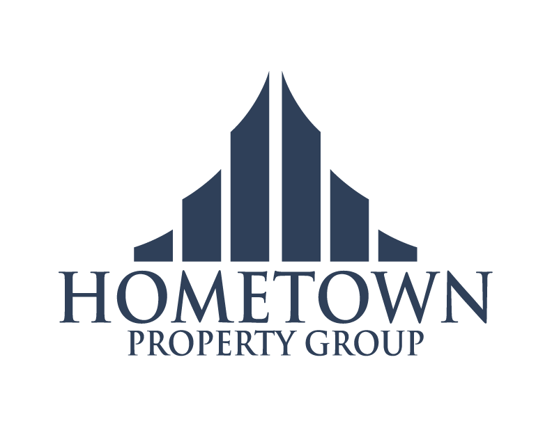 a logo for homestead property group with an image of a building