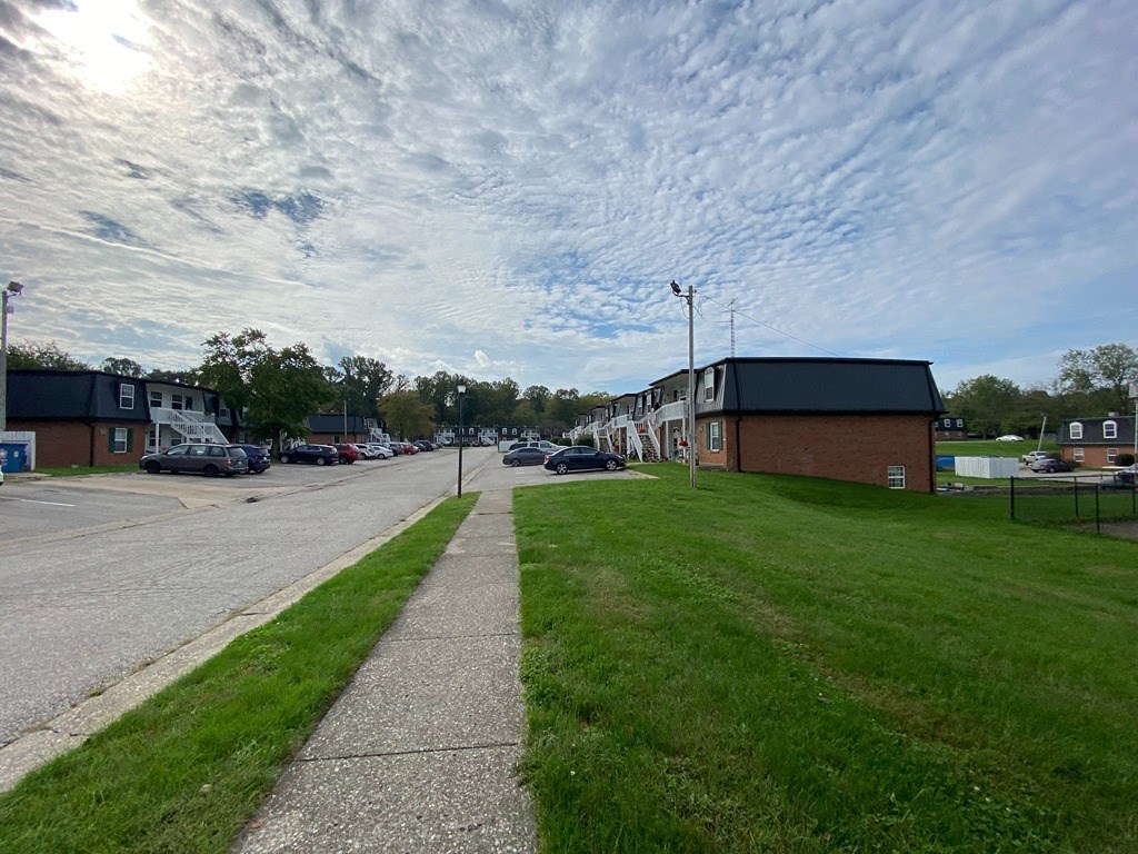 a sidewalk in the middle of a street