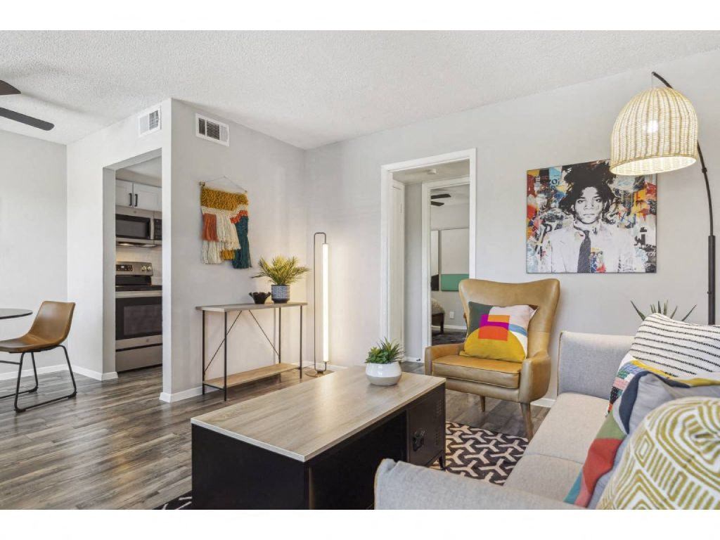 a living room with a couch and a table