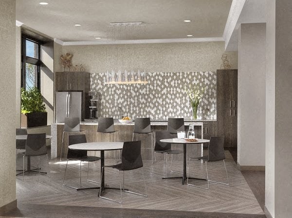 a dining room with tables and chairs