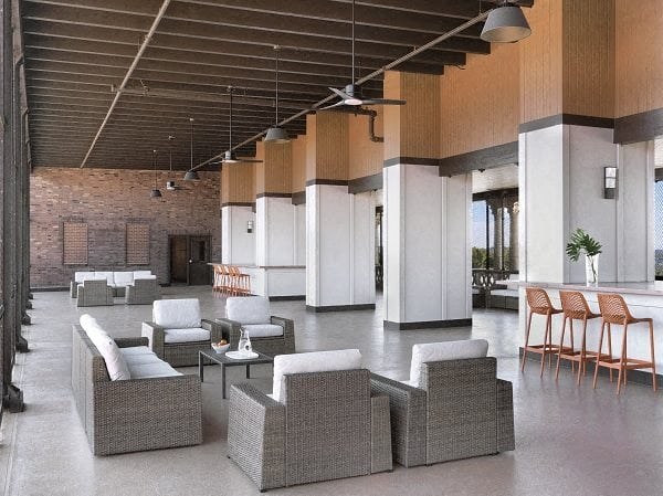 a large lobby with chairs and tables and