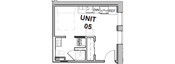 a floor plan of a small room with a bathroom and a desk
