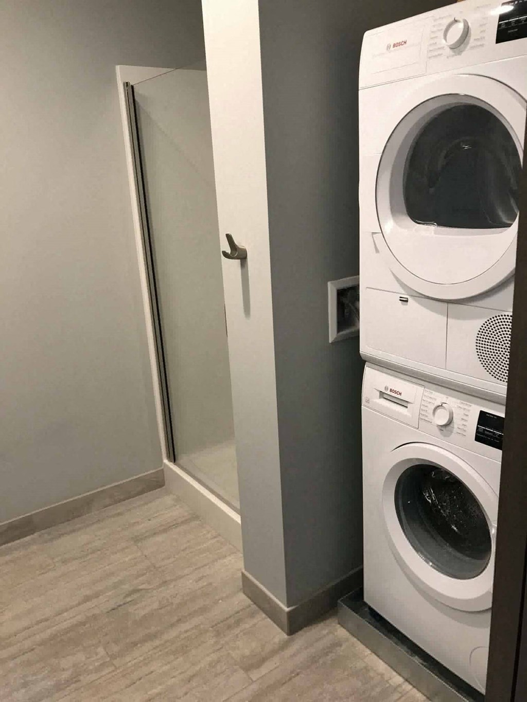 a washing machine and dryer in a laundry room