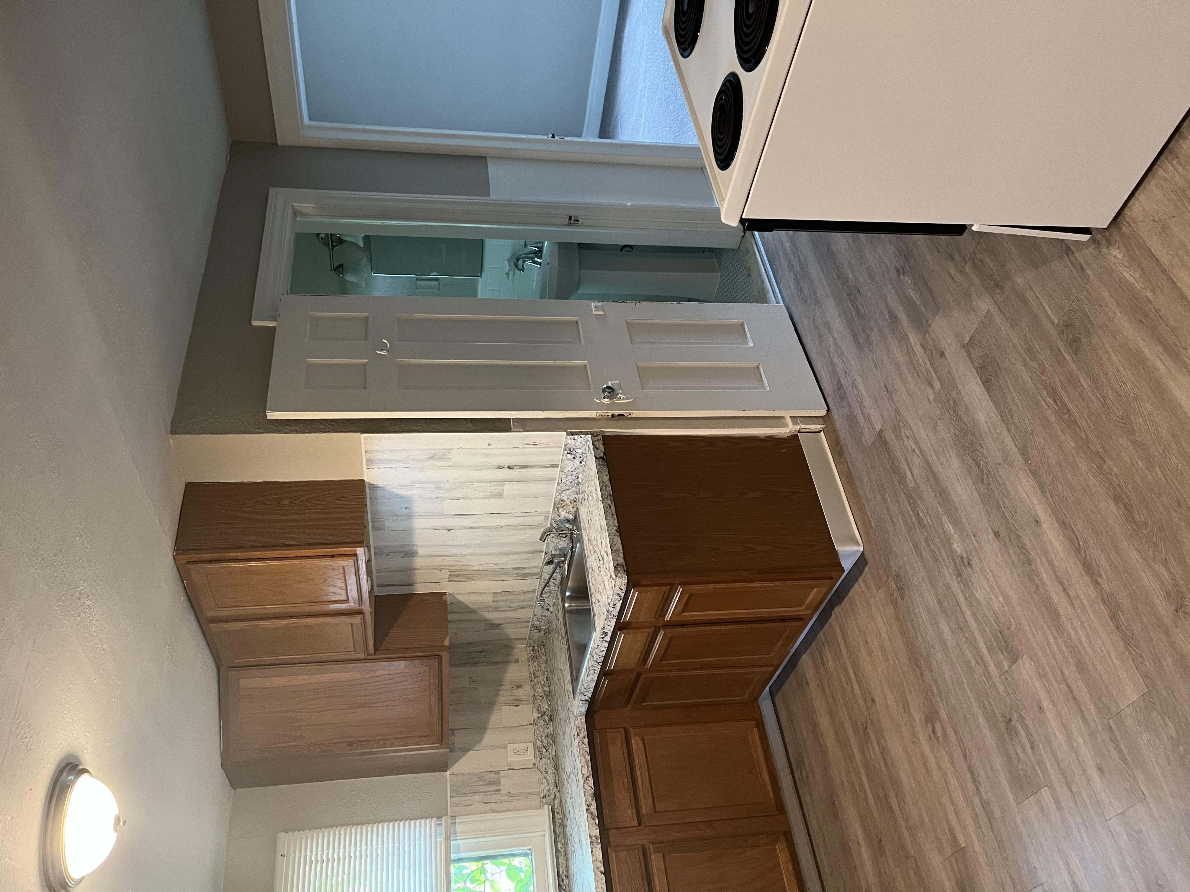 an overhead view of a kitchen with an island and a window