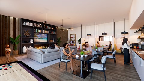 A group of people are gathered in a modern living room.