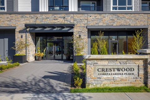 The front of a building with a sign that says Crestwood.