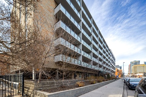 A large building with a lot of windows and balconies.