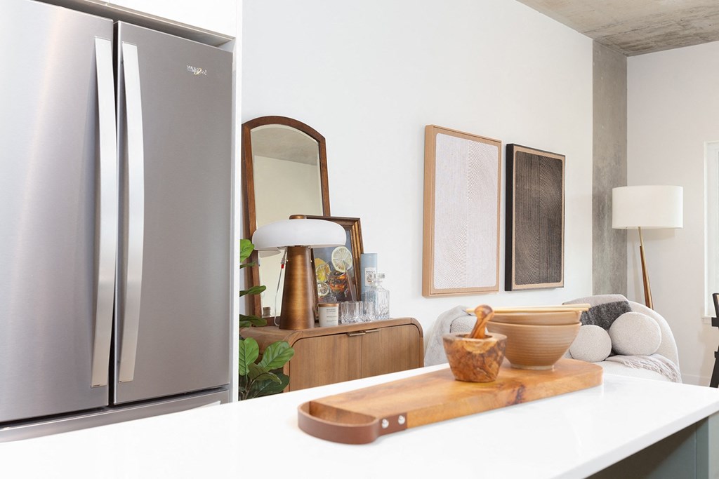 a kitchen with a counter top and a refrigerator