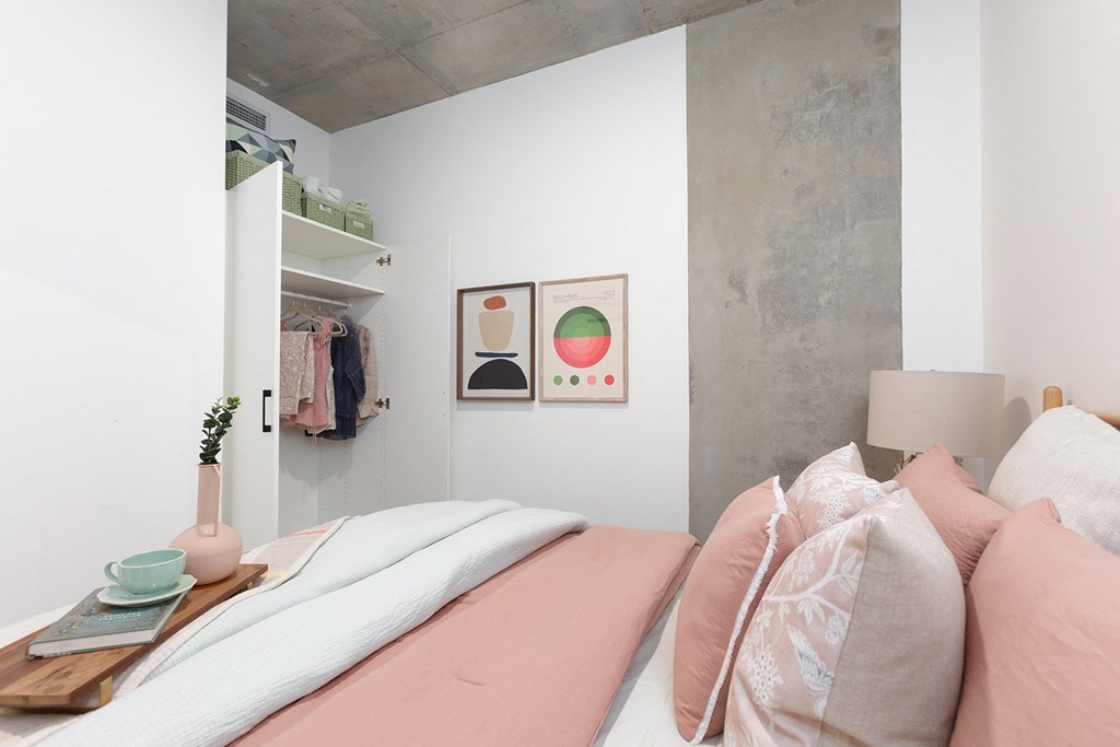 a room filled with lots of different colored pillows