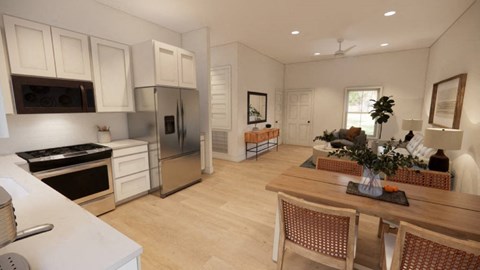 A kitchen with a dining table and chairs.