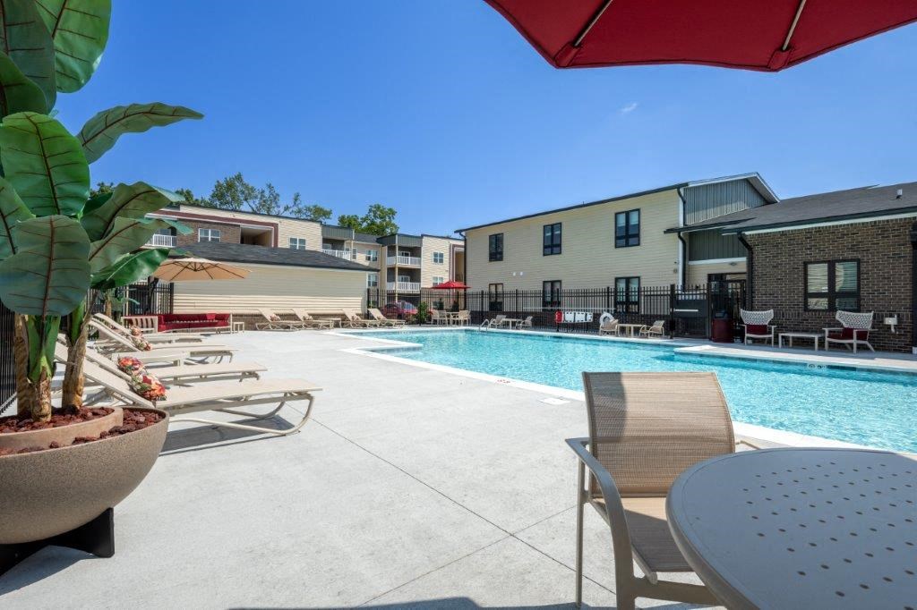 our apartments have a large pool and lounge chairs