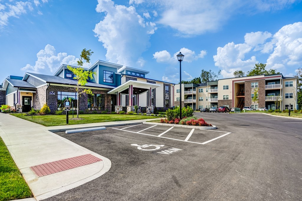 A parking lot with a sign that says