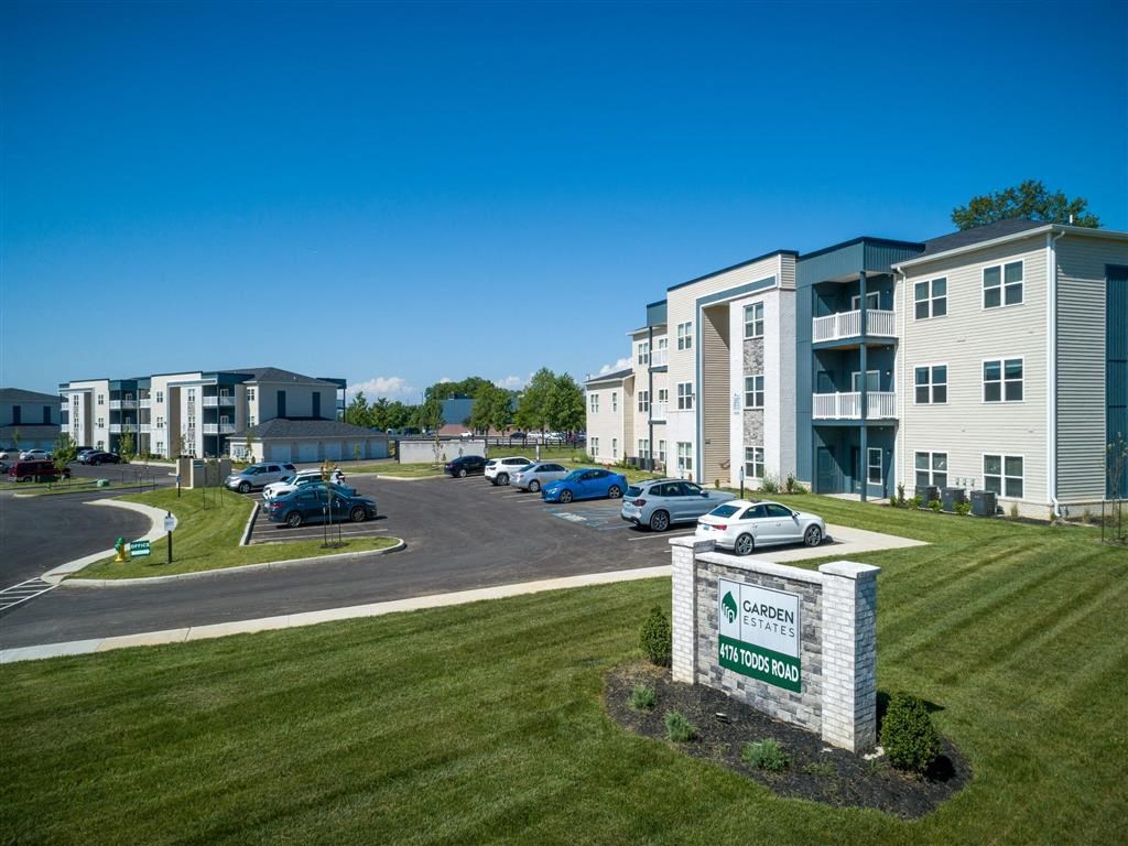 an aerial view of a protest sign in a grass field