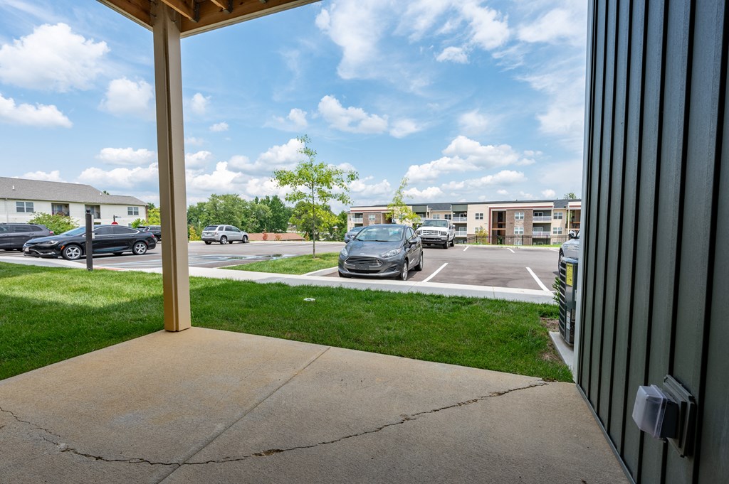 a view of a parking lot with cars parked in it