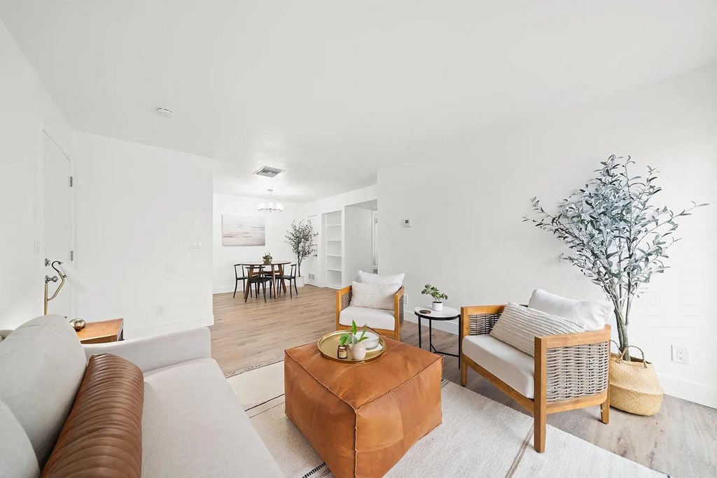 a living room with a couch and a table