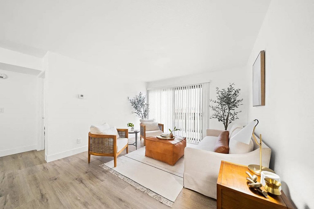 a living room with a couch and a table