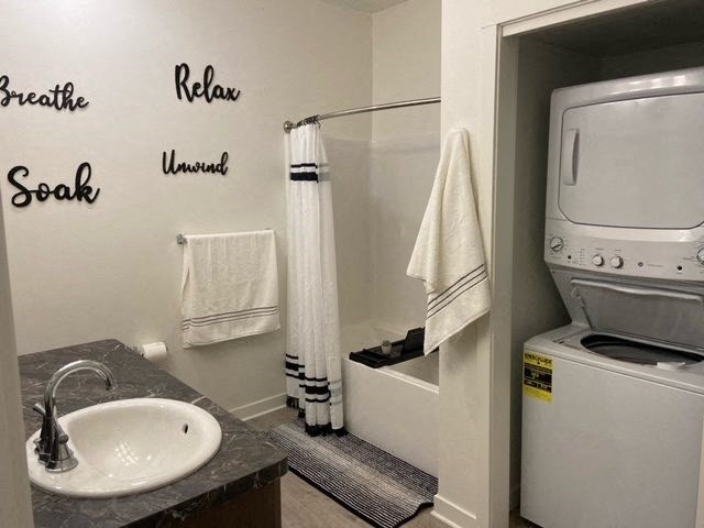 a bathroom with a sink and a washing machine