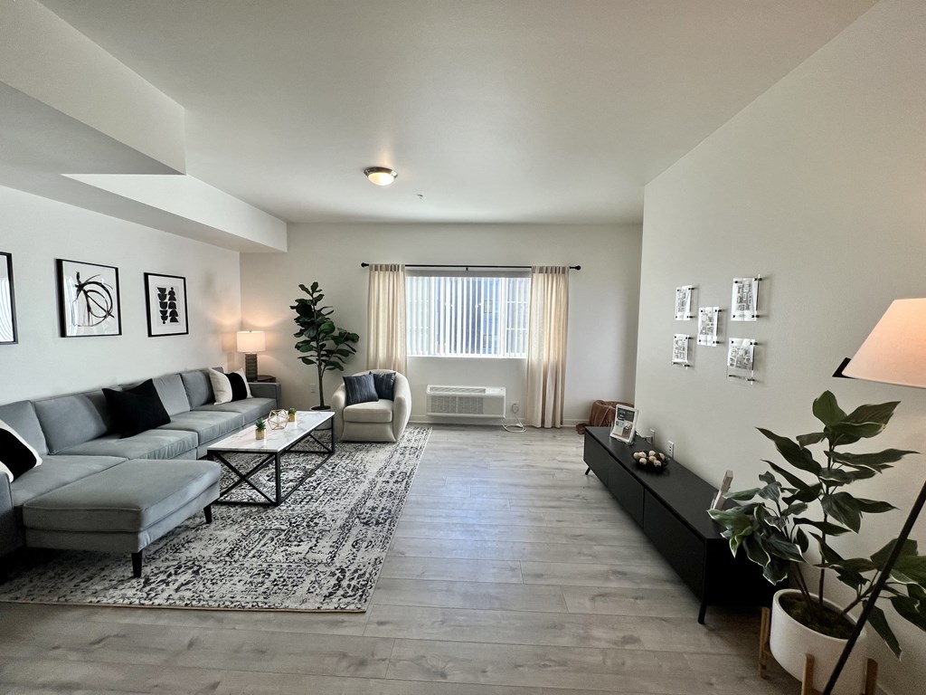 a living room with a couch and a table