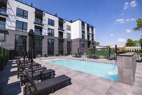 Pool With Relaxing Chairs at The Franklin at Westfield, Westfield New Jersey