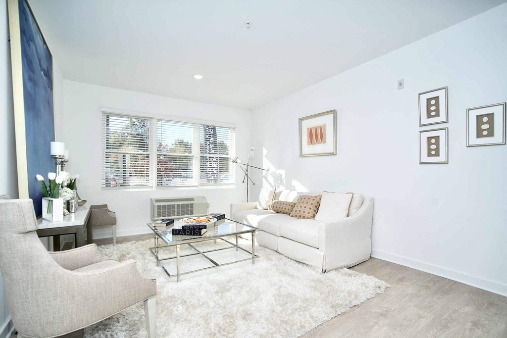 a living room with a couch and a table