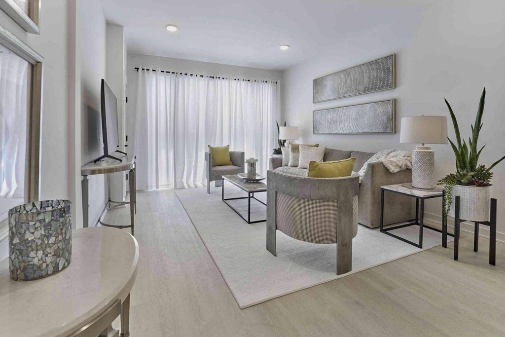 a living room with a couch and a table