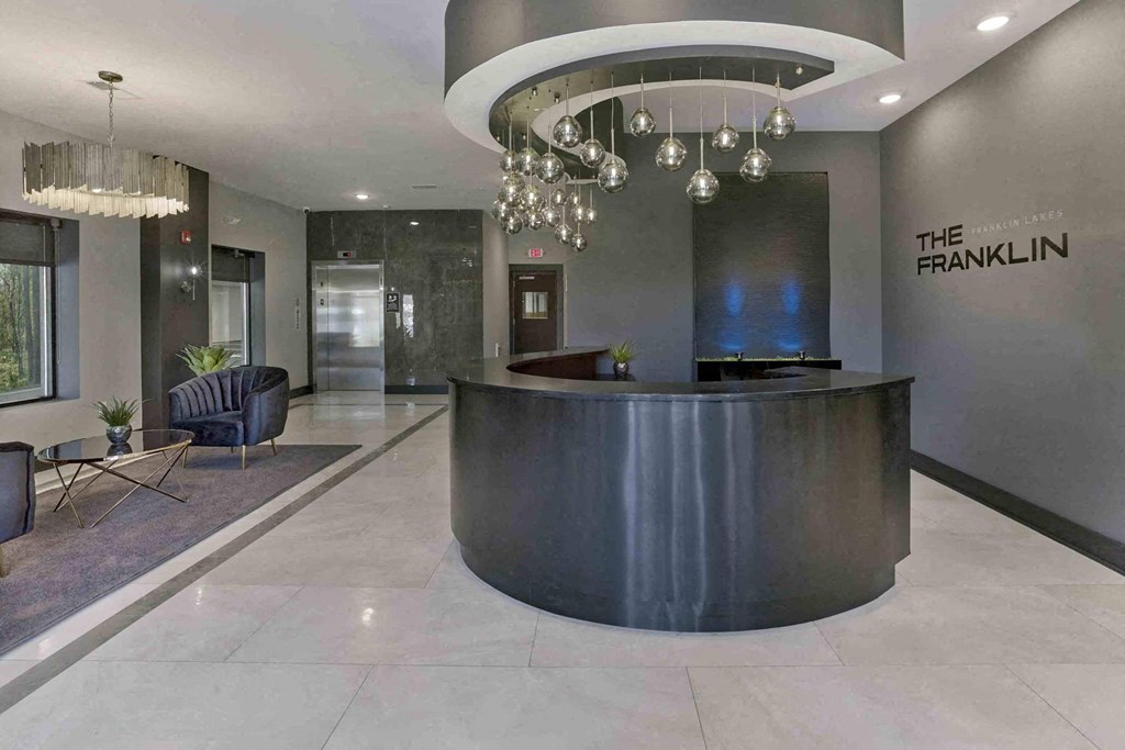 a view of the lobby with an abstract wall of triangles