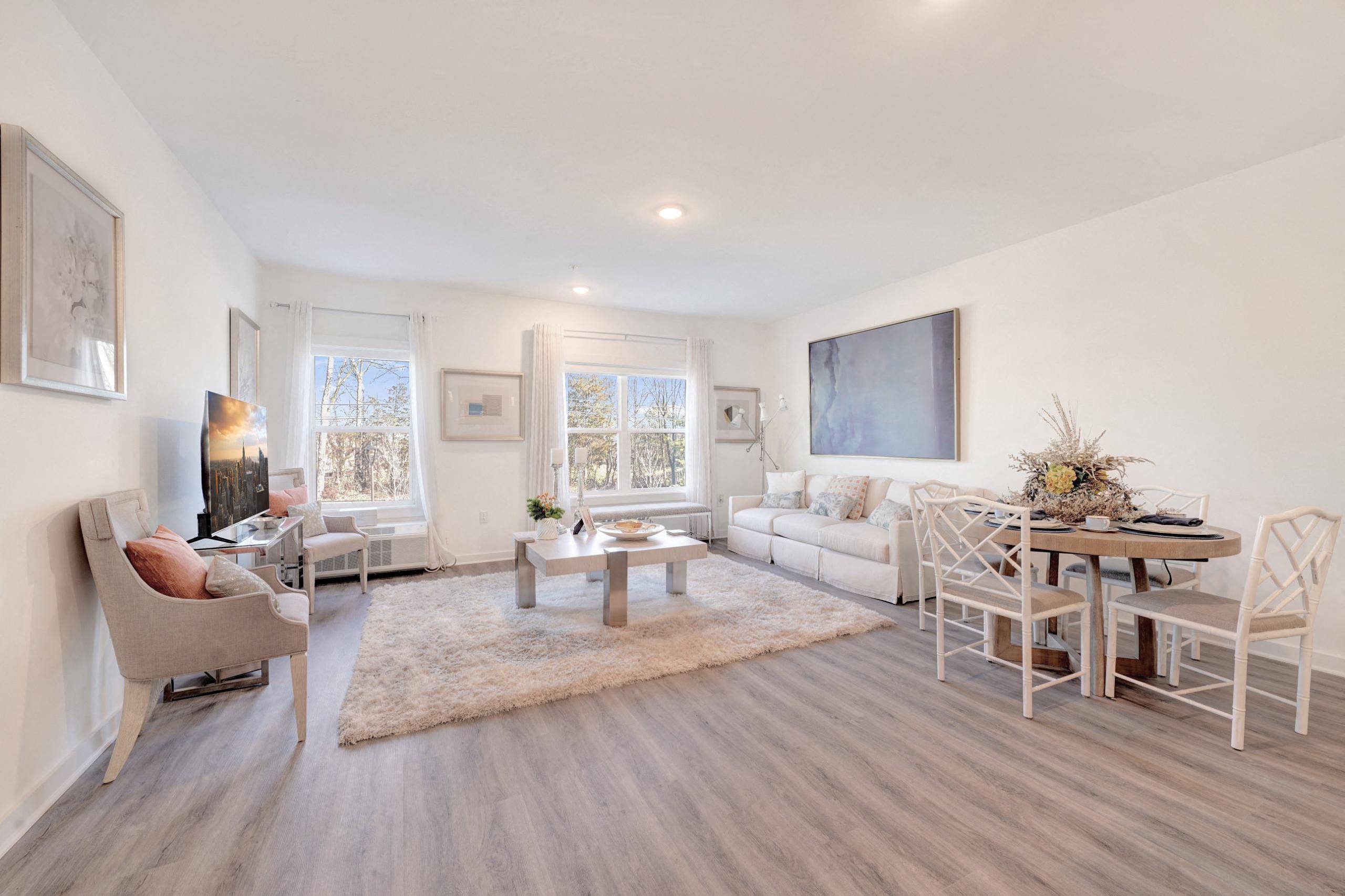 a living room with a couch and a table