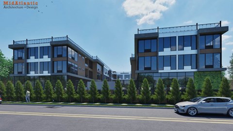 A modern building with a car parked in front.