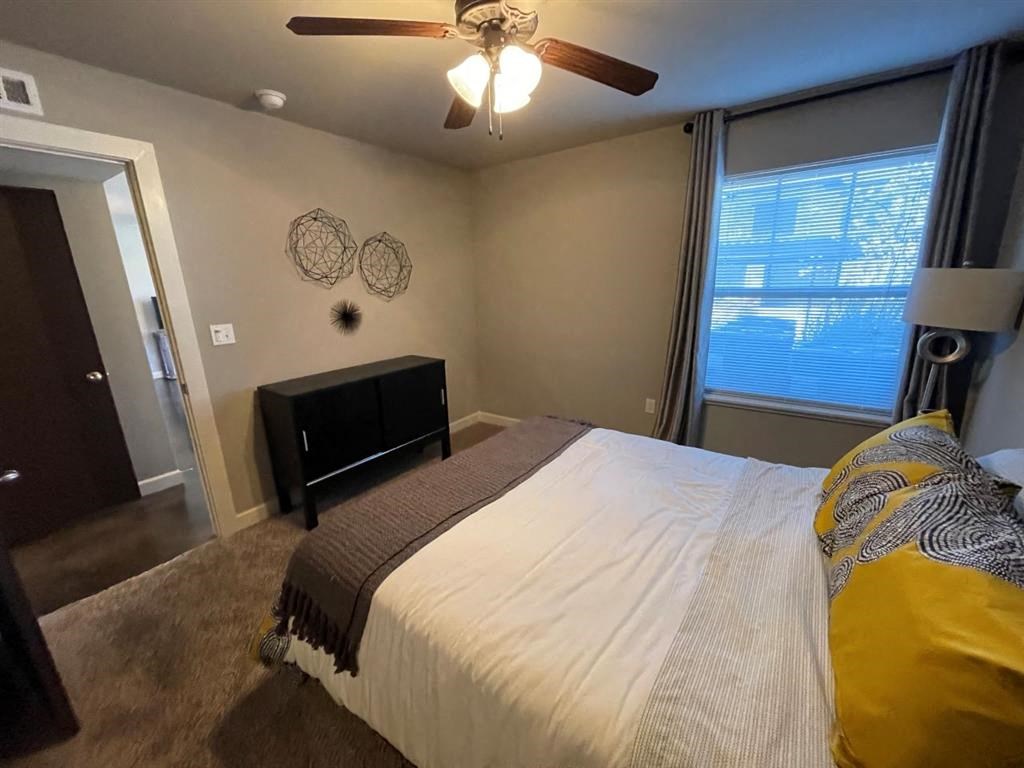 Bedroom With Ceiling Fan at Palisades at Pleasant Crossing, Rogers, AR 72758