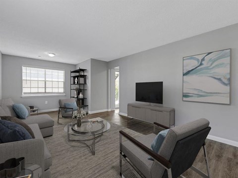 a living room with a couch and a television