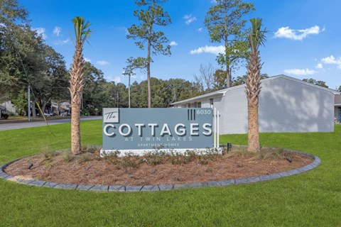 the sign at the entrance to theocatee sign in front of a building
