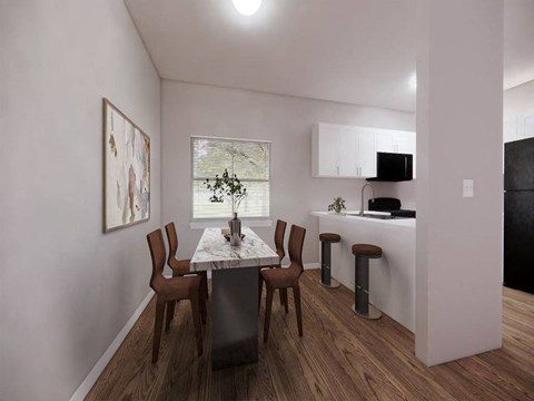 a kitchen and dining room with a table and chairs