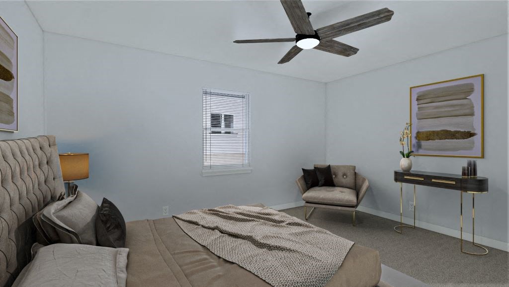 a bedroom with a bed and a ceiling fan