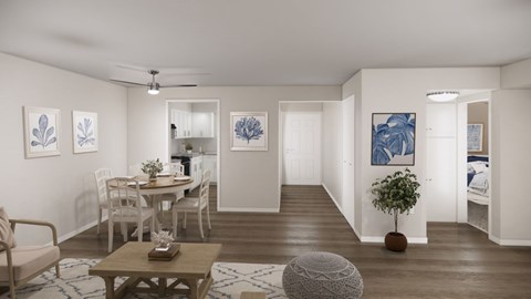 A living room with a dining table and chairs.