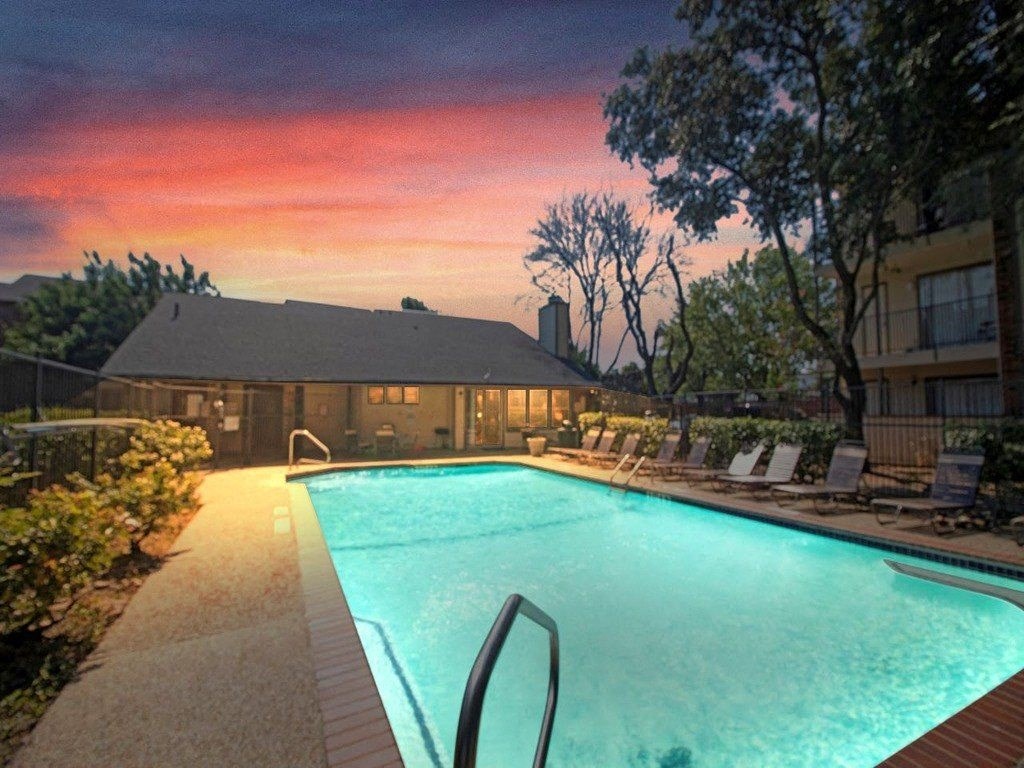the pool at sunset at the resort at governors crossing