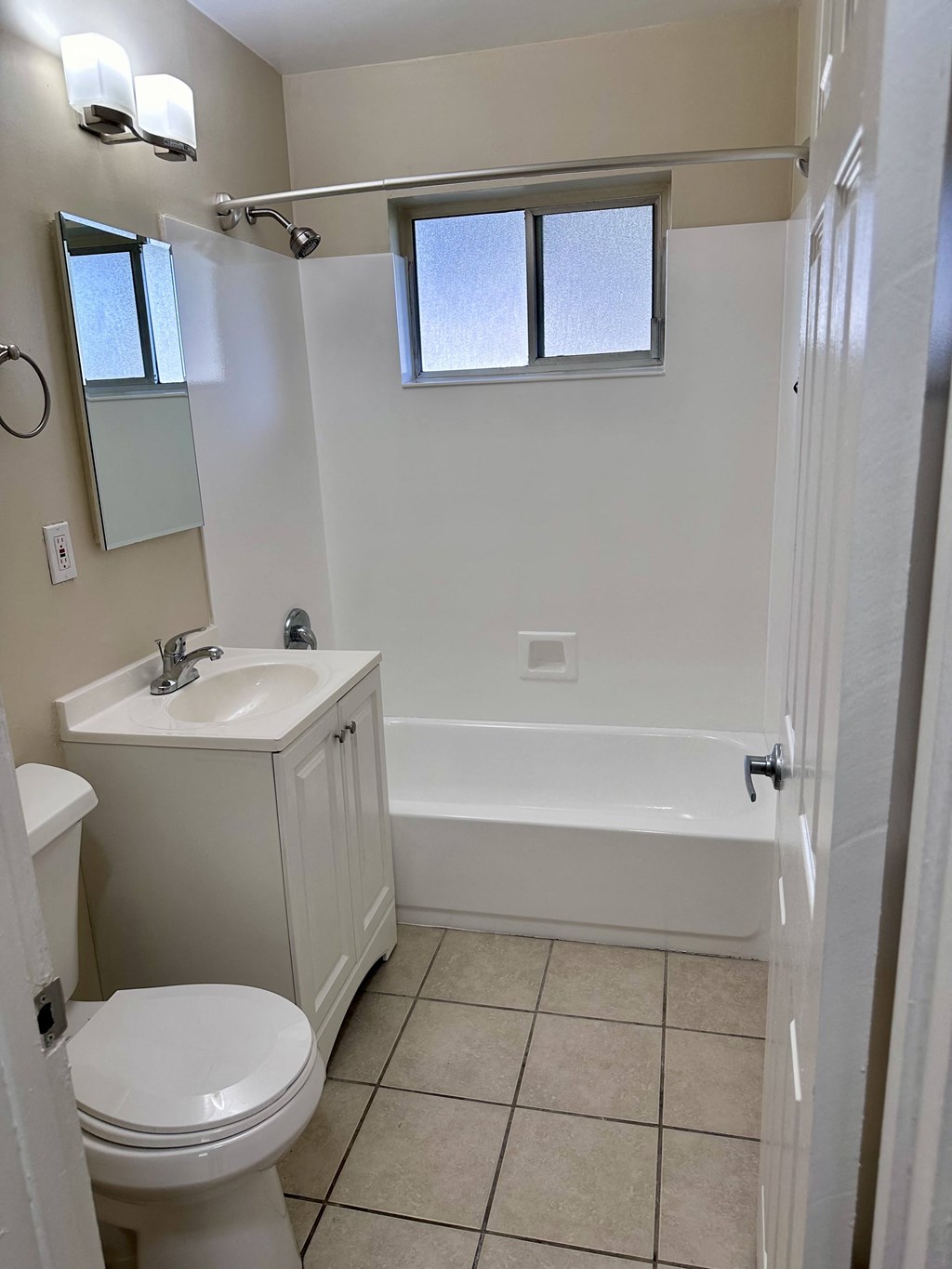 a bathroom with a sink toilet and a bath tub