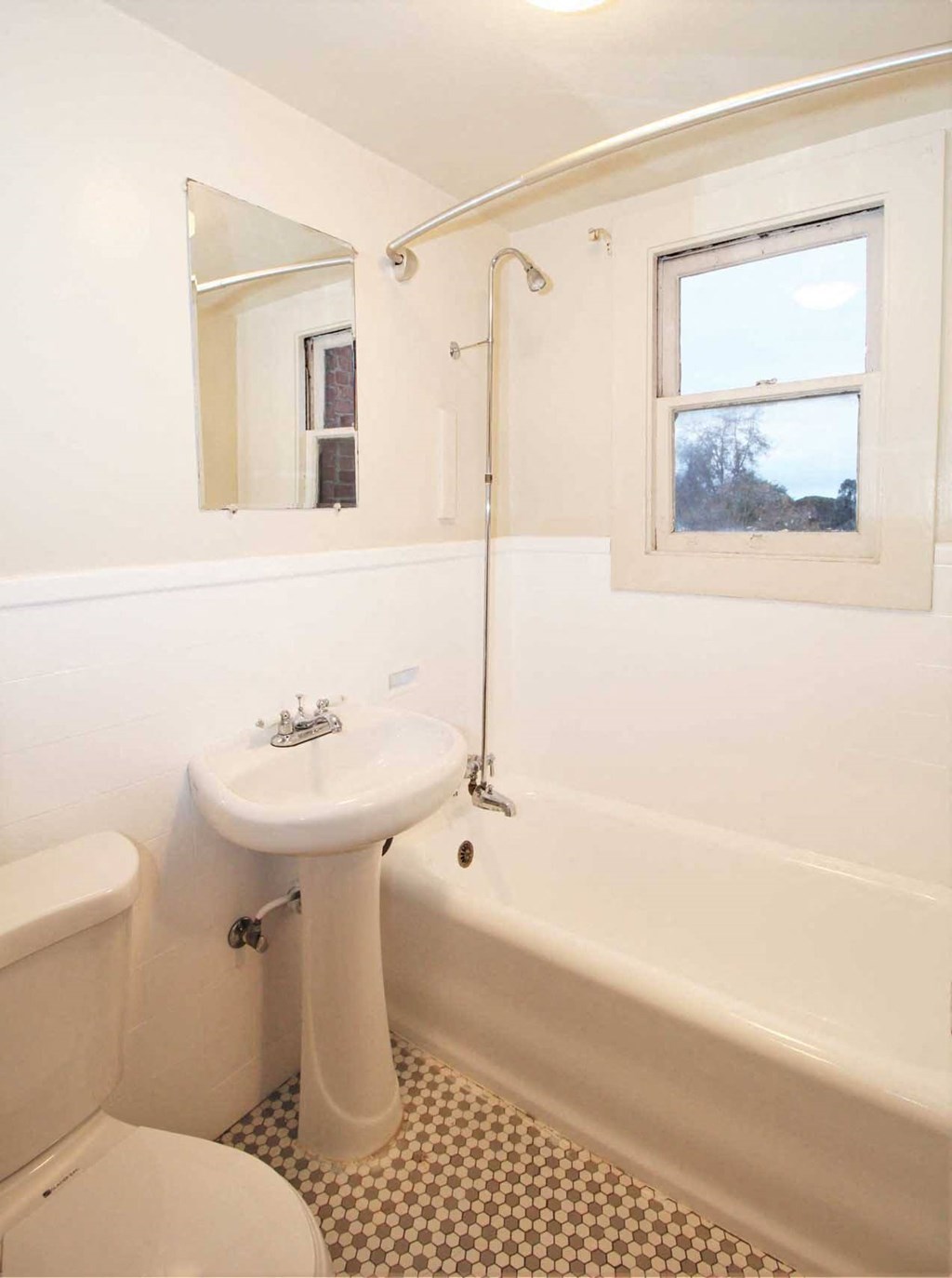 a bathroom with a sink and a bath tub