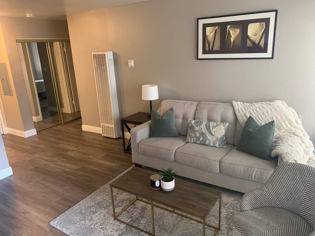 a living room with a couch and a coffee table
