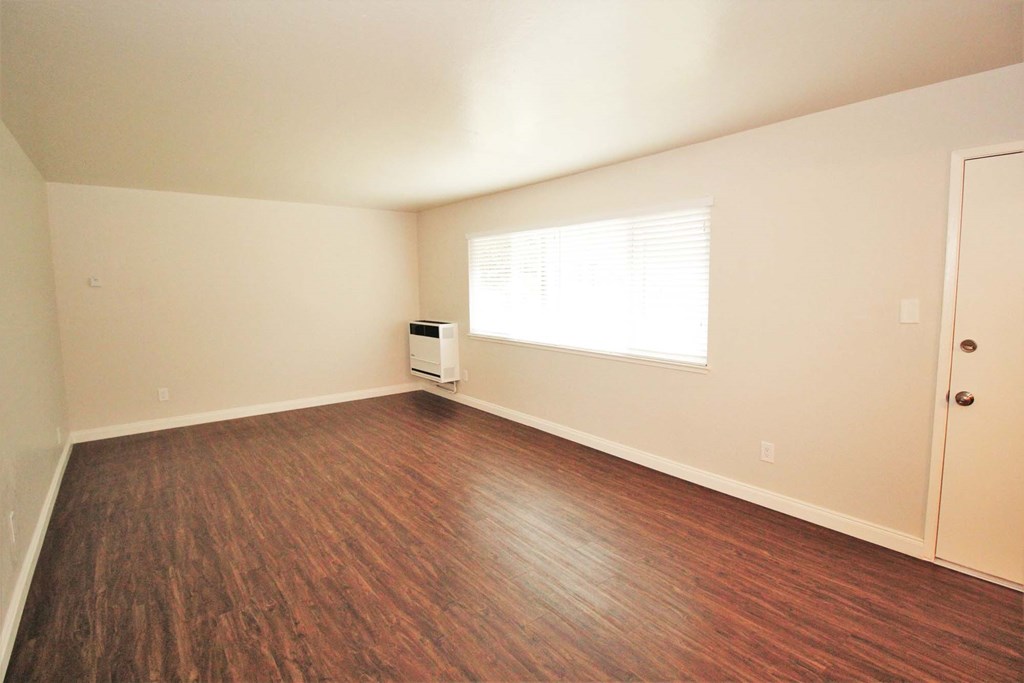 the inside of a building with stairs and a window