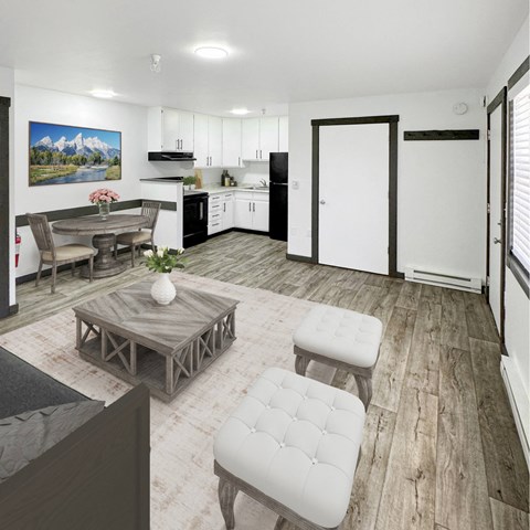 A modern kitchen with white cabinets and a painting of a mountain landscape on the wall.