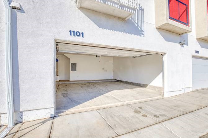 A white building with the number 1101 on it.