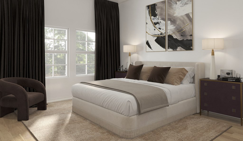 A modern bedroom with a large bed and a painting on the wall.