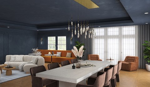 A modern dining room with a long table and chairs.
