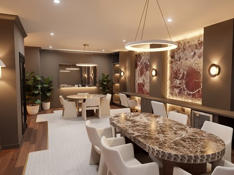 A modern dining room with a large table and chairs.