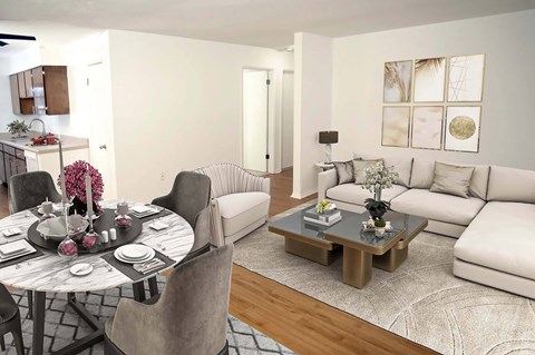 a living room and dining room with couches and a table