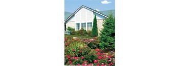 a house with a garden in front of it