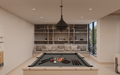A pool table is in the middle of a room with a couch and shelves in the background.