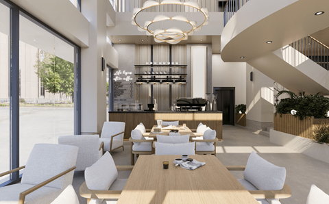 A modern dining area with a long table and chairs.
