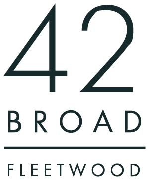A black and white image with the number 42 and the words broad and fleetwood.