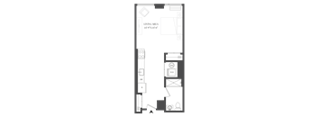 A floor plan of a living area with a kitchen, dining area, and bathroom.